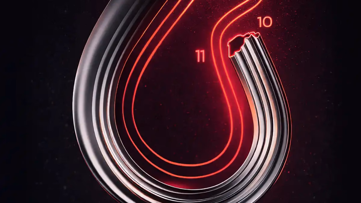 Troféu Monumental, um arco metálico que reproduz uma curva, com o traçado do circuito desenhado em neon vermelho ao fundo